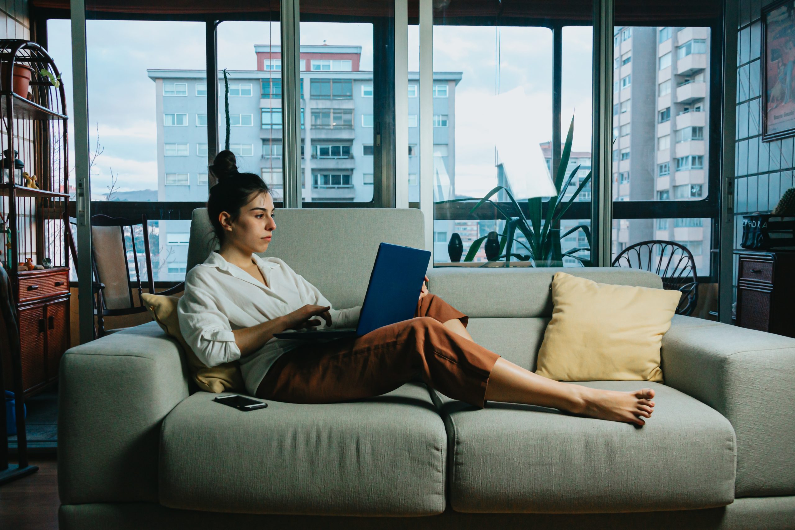 Upsizing Your Condo Woman Working From Home